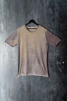 Naturally dyed cotton top. Loose fit dystopian long t-shirt. Seamless sleeves and bottom. Fabric is hand dyed using organic plant matter. Each piece is dyed individually and no two can ever be the same. One size Measurements: Chest: 120 cm / 47.2'' Waist: 114 cm / 44.9'' Shoulders: 56 cm / 22'' Sleeve: 30 cm / 11.8'' Length: 86 cm / 33.8'' One of the kind top! #127 Faded Pre-washed Cotton T-shirt, Acid Wash Cotton T-shirt With Natural Dye, Short Sleeve Cotton T-shirt With Natural Dye, Faded Pre-washed T-shirt For Streetwear, Faded Grunge Style Pre-washed T-shirt, Faded Grunge Pre-washed T-shirt, Cotton Pre-washed T-shirt For Streetwear, Pre-washed Cotton T-shirt For Streetwear, Washed Black Bleached Crew Neck T-shirt