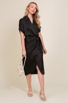 Elevate your evening attire with our stunning Satin Wrap Dress. This midi-length masterpiece combines elegance and allure, featuring a flattering V-neckline and a figure-enhancing wrap silhouette. The luxurious satin fabric drapes beautifully, creating a sleek and sophisticated look perfect for formal events, cocktail parties, or special occasions. Key Features: Surplice V-neckline for a feminine touch Wrap-style closure for adjustable fit Short sleeves for versatile styling Midi length for time Black Satin Mini Dress, Satin Wrap Dress, Designer Midi Dresses, Surplice Neckline, Wrap Midi Dress, Denim Mini Dress, Satin Mini Dress, Sheer Fabric, Black Wrap Dress