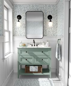 a bathroom with two sinks and a large mirror above the sink, along with a rug on the floor