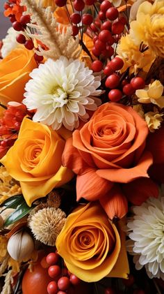 a bunch of flowers that are sitting on a table