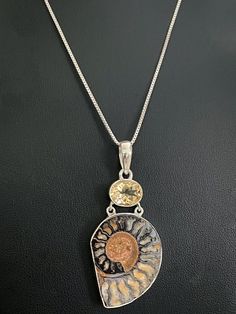 "GENUINE AMMONITE FOSSIL NECKLACE | CITRINE PENDANT Dainty & Minimalist Natural Ammonite Pendant | Citrine Necklace Metal:  All components are made from solid .925 Sterling Silver  Model is wearing 16\" in length solid .925 Sterling Silver  Chain Length available:  16\", 18\" or 20\" Measurements:  Genuine Ammonite Fossil and Citrine Pendant Height: 2 Inches Width: 1.5 Inches Please visit my storefront to view more of my creations: vonzjewel.etsy.com Thanks a lot for stopping by and supporting m Ammonite Pendant, Fossil Necklace, November Birthstone Jewelry, Beaded Ankle Bracelets, Silver Model, Beautiful Anklet, Jewelry Real, Ammonite Fossil, Citrine Pendant