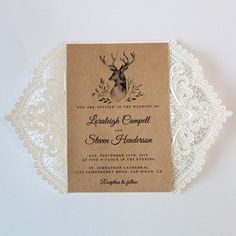 a wedding card with an image of a deer on it and lace doily around the edges