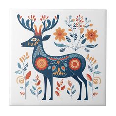 a ceramic tile with an image of a deer and flowers