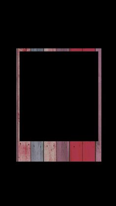 an empty wooden frame on a black background with multicolored wood planks in the center