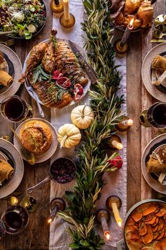 an overhead view of a table with food and candles on it, including turkeys