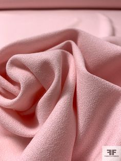 a close up view of a pink fabric