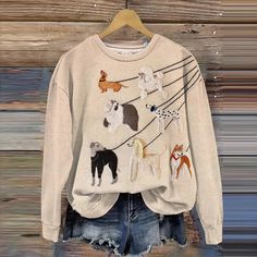 Fabric Name: 100% Cotton-blend Pattern: Embroidered Dog Process: Printed Style: Casual Length: Regular Collar: Round Neck Popular Elements: Embroidered Art Sleeve Type: Long Sleeve Occasion: Daily Theme: Spring, Fall, Winter Size Length Shoulder Bust Sleeve CM INCH CM INCH CM INCH CM INCH S 66 25.98 42 16.54 102 40.16 61 24.02 M 68 26.77 44 17.32 106 41.73 63 24.80 L 70 27.56 46 18.11 110 43.31 65 25.59 XL 72 28.35 48 18.90 114 44.88 67 26.38 2XL 74 29.13 50 19.69 118 46.46 69 27.17 3XL 76 29.92 Long Sleeve Cotton T-shirt With Dog Print, Cotton Long Sleeve T-shirt With Dog Print, Fall Long Sleeve Tops With Dog Print, Cotton Crew Neck Top With Dog Print, Casual Crew Neck Tops With Dog Print, Fall Crew Neck Top With Dog Print, Winter Dog Print Crew Neck Top, Winter Crew Neck Top With Dog Print, Casual Dog Print Sweatshirt For Winter