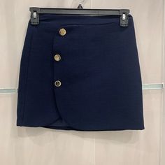 Navy Zara Skirt Condition:Great Never Worn Navy With Buttons Brand New But Tag Fell Off Size Xs Fitted Blue Mini Skirt With Button Closure, Blue Asymmetrical Skirt For Workwear, Elegant Blue Zara Skirt, Chic Blue Mini Skirt With Button Closure, Chic Blue Short Skirt, Chic Short Blue Skirt, Zara Blue Lined Mini Skirt, Blue Mini Skirt With Buttons, Blue Buttoned Mini Skirt