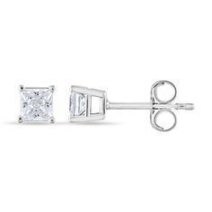 Wear these princess-cut diamond stud earrings with both casual and formal attire. They are made with 14K white gold, which is resilient enough for every day wear, and they have butterfly clasps to keep them secure.The diamonds are set in a four-prong setting for added security. They are IGI certified, which means they come with a certificate that verifies the color and clarity ratings. Pair the simple studs with everything from casual to classic wardrobes.Clear and Nearly ColorlessThese diamond Formal Cubic Zirconia Earrings With Tension Setting, Formal Earrings With Tension Setting, Timeless Tension Setting Earrings For Anniversary, Fine Jewelry Sterling Silver Diamond Earrings With Tension Setting, Timeless Earrings With Tension Setting For Anniversary, Classic Diamond White Square Cut Earrings, Classic Square Cut Diamond White Earrings, Diamond White Earrings With Tension Setting For Formal Events, Silver Diamond Earrings With Tension Setting