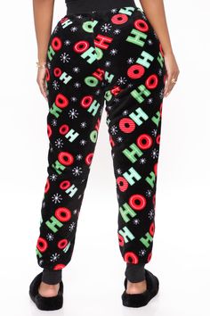 Available In Black/combo. Plush PJ Leggings Perfect For The Holidays! Wide Leg Pant Drawstring Waist Ho Ho Ho Print Full Stretch Disclaimer: Print Placement Will Vary Final Sale 100% Polyester Imported | Ho Ho Ho Plush PJ Joggers in Black size X-Large by Fashion Nova Stretch Black Bottoms For Christmas, Black Bottoms For Christmas Loungewear, Black Christmas Loungewear Bottoms, Black Loungewear Bottoms For Christmas, Casual Black Pants For Christmas, Pj Leggings, Fashion Dress Up Games, Lingerie Accessories, Wide Leg Pant