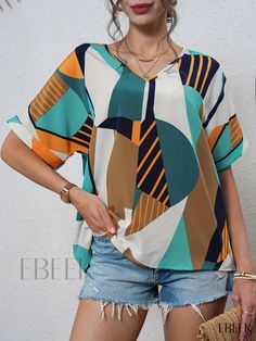 Ebeek - Womens Patchwork Graphic Print Blouse - Stylish V Neck Short Sleeve Casual Top - Fashionable Clothing for Women Multicolor V-neck Color Block Blouse, Casual Tops With Multicolor Geometric Pattern, Trendy Green Tops With Colorful Pattern, Trendy Green Top With Colorful Pattern, Trendy Multicolor Geometric Pattern Blouse, Casual Green Tops With Geometric Pattern, Casual Green Top With Geometric Pattern, White Geometric Pattern Blouse For Summer, White Blouse With Geometric Pattern For Summer