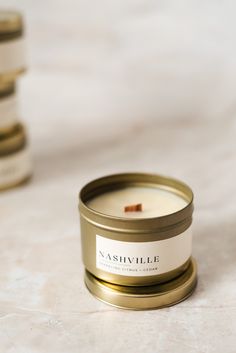 a candle sitting on top of a white table