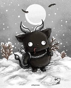 a black animal with horns standing in the snow