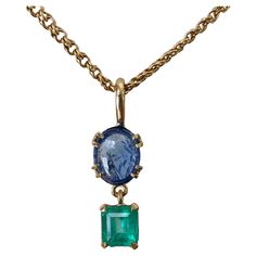 Gorgeous Vintage Pendant Drop Necklace. Natural untreated 4.40 carat Burmese vibrant cornflower blue color sapphire cabochon with emerald cut Colombian emerald approx 1.80 carat, set in 18k yellow gold. The pendant is accompany by a 18.5" chain 14K yellow gold. The total weight of the necklace is 12.5 grams. Pendent necklace is in very good condition. Art Deco Pendant Necklace, Aesthetic Jewellery, Sapphire Pendant Necklace, Sapphire Diamond Pendant, Flower Choker Necklace, Sapphire Cabochon, Antique Necklaces, Sapphire Necklace Pendants, Beaded Necklace Designs