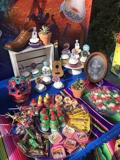 a table filled with lots of candy and treats