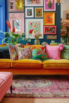 a living room filled with lots of colorful furniture and pictures on the wall above it