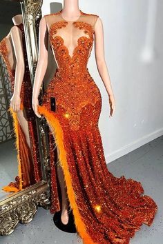 Indulge in the ultimate luxury with our Prom Queen Dress, crafted from stretchy fabric for a flawless fit. The vibrant orange color is accentuated by a dazzling rhinestone panel, feathers and delicate sequins, exuding elegance and sophistication. Perfect for proms or weddings, this Maxi style will elevate your look to new heights. Orange And Grey Prom Dress, Red Prom Dress Inspiration, Orange Prom Dresses Black Women, Orange Prom Couple, Prom Dresses Orange, Burnt Orange Prom Dress, Prom Queen Dress, Orange Prom Dress, Autumn Princess