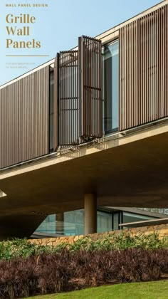 the cover of wall panel design magazine features an image of a building with wooden slats on it