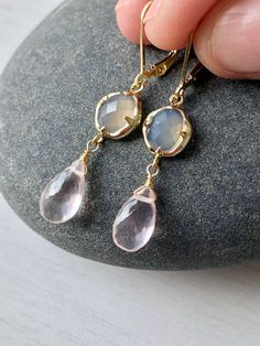 Rose Quartz and Gray Moonstone Earrings, Blush Pink Dangle Gold Earrings, Delicate Two Stone Drops Earrings, Elegant Gift for Girlfriend These blush elongated drop earrings feature gray moonstone hexagonal stones framed in 14k gold filled and suspended from them are micro faceted pastel pink rose quartz teardrops, wire wrapped in 14k Gold Filled. The Earrings are suspended from gold filled lever back ear wires. These are ideal for a night out, they are a great choice for causal wear and they wil Elegant Rose Quartz Drop Earrings, Elegant Teardrop Rose Quartz Earrings, Rose Quartz Gemstone Dangle Earrings, Elegant Nickel-free Rose Quartz Earrings, Pink Rose Quartz Drop Earrings, Rose Quartz Teardrop Earrings For Gift, Rose Quartz Drop Earrings For Jewelry Making, Rose Gold Rose Quartz Drop Earrings, Rose Quartz Gemstone Drop Earrings