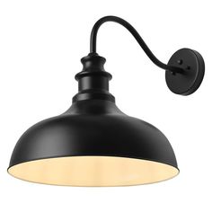 a black wall light with a white light on the top and bottom half of it