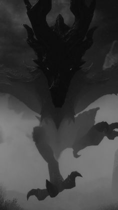 a black and white photo of a dragon flying through the air with clouds in the background