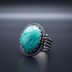 Timeless Adjustable Oval Rings, Timeless Large Stone Ring Jewelry, Timeless Jewelry Ring With Large Stone, Timeless Jewelry With Large Stone, Modern Turquoise Anniversary Ring, Concave Gemstone Rings As Gift, Fusion Style Oval Rings With Polished Finish, Modern Turquoise Gemstone Ring, Modern Gemstone Dome Ring For Promise