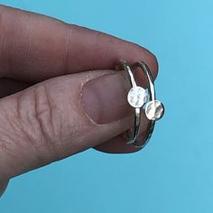 "This listing is for one delicate, hammered silver ring, size 7.25 or 8 US.  Please specify ring size at checkout. Each ring has a little hammered silver disc soldered to the ring. Each disc is approximately 3/16\" in diameter." Simple Hammered Ring Jewelry, Dainty Hammered Rings, Dainty Hammered Midi Rings For Anniversary, Everyday Adjustable Hammered Stackable Rings, Minimalist Adjustable Hammered Midi Rings, Dainty Adjustable Hand Forged Stackable Rings, Dainty Hand Forged Adjustable Stackable Rings, Hand Forged Dainty Stackable Rings, Dainty Hammered Stackable Open Rings