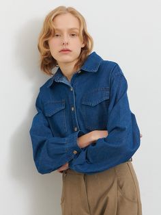 This product is the Pocket Denim Shirt, designed for a casual yet stylish look. It features a relaxed fit with two chest pockets, adding both functionality and a fashionable touch. The durable denim fabric ensures long-lasting wear and a comfortable feel. - This Pocket Denim Shirt includes two functional chest pockets for added convenience.- Made from high-quality denim, it offers durability and a classic look.- The relaxed fit ensures comfort while maintaining a stylish silhouette.- Perfect for casual outings, it can be easily paired with jeans or skirts for a versatile wardrobe staple. Denim Tops For Everyday Fall Wear, Everyday Denim Tops For Fall, Medium Wash Relaxed Fit Long Sleeve Denim Top, Relaxed Fit Long Sleeve Medium Wash Denim Top, Relaxed Fit Long Sleeve Denim Top In Medium Wash, Medium Wash Denim Top Relaxed Fit Long Sleeve, Collared Denim Top With Pockets, Denim Tops With Buttoned Pockets And Long Sleeves, Trendy Dark Wash Denim Top With Pockets