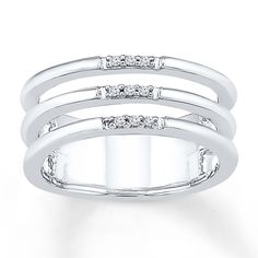 a white gold ring with three rows of diamonds