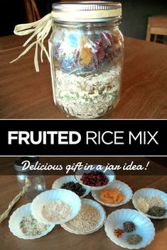 a jar filled with lots of different types of food on top of a wooden table