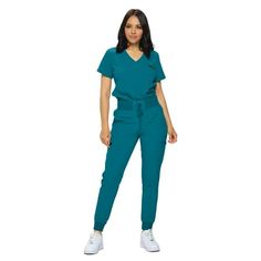 Finally a scrub set that checks all the boxes. Made from a premium stretch fabric, our jogger scrub set offers exceptional flexibility and ease of movement, ensuring all-day comfort during your busy shifts. The jogger-style bottoms provide a relaxed yet flattering fit, while the tuck-in scrub top adds a touch of professionalism. Elevate your workwear wardrobe with our Women's Stretch Jogger Scrub Set and experience the perfect combination of style and functionality. Size: L.  Color: Blue.  Gende Jogger Scrubs, Workwear Wardrobe, Womens Scrubs, Scrub Sets, Fashion Joggers, Joggers Womens, Top For Women, Scrub Tops, Blue Gender