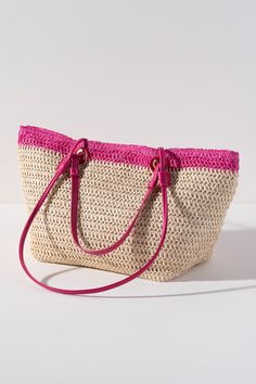 Carry your essentials in style this summer with Shiraleah's Syracuse Tote. The natural woven paper straw is accented with a stripe of fuchsia and features both matching PU handles and shoulder straps to add some versatility to your style. Pair with other items from Shiraleah to complete your look! Features Double Handles, Double Shoulder Straps, Magnetic Snap Closure, And 1 Inner Slip Pocket Shiraleah Is A Trend-Driven Lifestyle Brand Focused On The Little Gifts That Make Life Special! Made From Paper Straw And Pu Measures L 19.5" X W 7" X H 10"; Handles 9"; Strap 15" Made In China Chic Straw Bag For Summer Outings And Spring, Chic Straw Bag For Spring And Summer Outings, Spring Vacation Straw Bag, Multicolor Straw Bag For Summer Day Out, Woven Straw Bag For Summer Outings, Summer Multicolor Straw Bag For A Day Out, Pink Woven Straw Bag For Beach, Pink Rectangular Straw Bag For Beach, Rectangular Pink Straw Bag For Summer