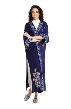 Blossoming flowers sweeten the look of a topper that boasts a longline silhouette for an air of elegance. 54" length Three-quarter sleeves 100% rayon Hand wash, line dry Imported Model stats: 5'10" height, 32" bust, 25" waist, 36" hip. Long Floral Embroidered Kimono For Spring, Blue Rayon Kimono For Spring, Long Sleeve Rayon Kimono For Spring, Blue Floral Embroidered Kimono For Spring, Spring Long Rayon Kimono, Long Rayon Kimono For Spring, Long Sleeve Rayon Kimono, Paisley Kimono, Paisley Motifs