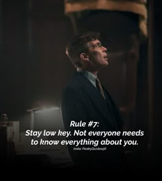 a man in a suit and tie with a quote on it that says, rules 7 stay low key not everyone needs to know everything about you