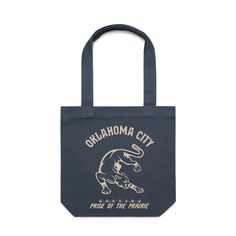 a blue tote bag with the words,'quahomama city pride of the