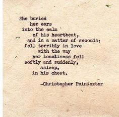 an old typewriter with the words, she buried her ears into the ear of his heartbeat and in a matter of love