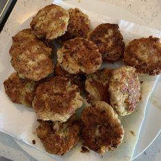 some fried food is on a white plate