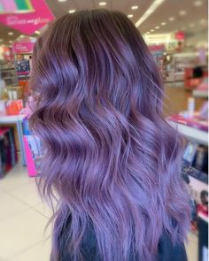 22 Perfect Examples of Lavender Hair Colors To Try Hot Hair Colors 2024, Lilac Hair Dark Roots, Lavender Hair Dark Roots, Light Purple Balayage, Lavender Money Piece Hair, Dusty Lavender Hair, Dusty Purple Hair, Soft Purple Hair