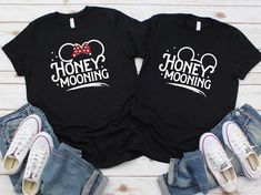 two t - shirts with minnie mouse ears on them and the words honey mooning