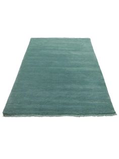 a green rug on a white background