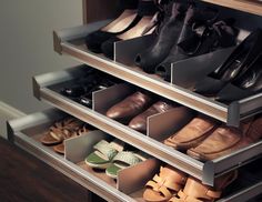 several pairs of shoes are stored in the drawers