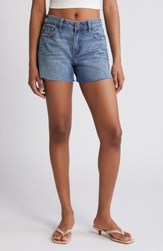 Enjoy the sunshine in casual-cool cutoff shorts made from nonstretch denim with a mid-rise waist, raw hems and hints of distressing. 4" inseam; 9 1/2" front rise Zip fly with button closure Five-pocket style 100% cotton Machine wash, tumble dry Imported Relaxed Fit Jean Shorts With Frayed Hem, Medium Wash Shorts With Frayed Hem, Medium Wash Jean Shorts With Frayed Hem, Medium Wash Cutoff Shorts For Summer, Cutoff Medium Wash Shorts For Summer, Summer Cutoff Medium Wash Shorts, Cotton Cutoff Jean Shorts With Frayed Hem, Trendy Relaxed Fit Cutoff Jean Shorts, Cotton Jean Shorts With Frayed Hem