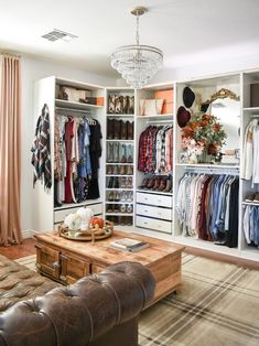 a living room filled with furniture and lots of closet space