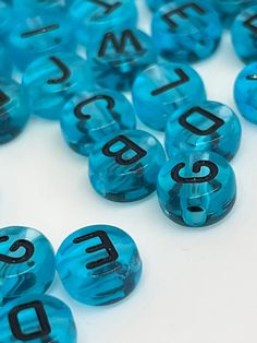 blue and black dices with numbers on them