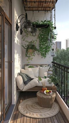 the balcony is decorated with hanging plants and wicker furniture, including an outdoor sofa