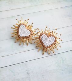 Sparkle heart earrings White gold beaded earrings Shiny stud heart earrings Beaded earrings Fashion earrings Trendy earrings Trendy earrings in the shape of a heart.For your bright image! Length : 4 cm( 1.8 inches) Product color may appear different depending on viewer's monitor condition. Gold Beaded Heart Earrings For Gift, Handmade Gold Beaded Earrings For Valentine's Day, Heart-shaped Beaded Earrings, Gold Heart Beaded Earrings For Party, Gold Heart Shaped Beaded Earrings For Party, Gold Heart-shaped Beaded Earrings For Party, Gold Heart-shaped Earrings With Heart Beads, Gold Heart Beaded Earrings For Valentine's Day, White Double Heart Earrings With Heart Beads