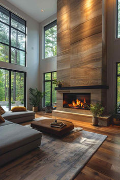 40 Fireplaces With Windows on Each Side for Modern Spaces Modern Fireplaces Ideas Living Rooms, Fireplace Contemporary Design, Fireplace Cladding Ideas, Living Room Beams Ceiling Vaulted, Modern Fireplace With Built Ins On Both Sides, Modern Mountain Fireplace, Modern Organic Fireplace Ideas, Indoor Fireplace Living Rooms, 2 Story Fireplace Wall