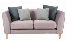 two pillows on the back of a pink couch with grey and green cushions, both facing each other