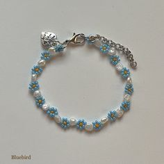 "Handmade Beaded Bracelets ✿ Choose your favorite bloom ✿ Made with glass seed beads, freshwater pearls, and metal accents ✿ Each bracelet has 1.5 - 1.75\" of extension chain" Stolen Image, Handmade Beaded Bracelets, Bracelet Diy, Bracelets Handmade Beaded, Metal Accents, Glass Seed Beads, Bracelet Crafts, Phone Charm, Metallic Accents