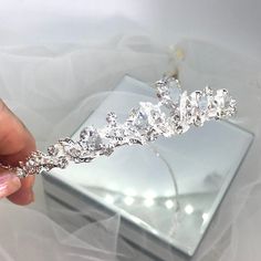 PERLA - Silver & Crystal Wedding Bridal Tiara A super sparkling tiara measuring 26mm high in the centre Swarovski Crystals make this tiara sparkle all over, a simply stunning piece. This beautiful Tiara comes packed in a pretty white box and is shipped with tracking. Feel free to look at all of my beautiful stock on any of my pages; www.bejewelledbridal.com.au www.facebook.com/bejewelledbridal.com.au www.instagram.com/bejewelled_bridal Thank you for visiting Bejewelled Bridal White Tiara, Silver Headpiece, Tiara Bride, Tiara Silver, Swarovski Tiara, Medieval Aesthetic, Tiara Headpieces, Silver Head Piece, Bridal Hair Accessory